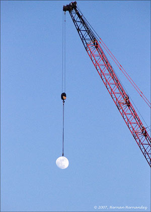 Picture of a crane hauling the Moon around