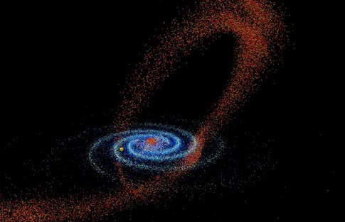 Image of the Milky Way eating a smaller galaxy, from http://astsun.astro.virginia.edu/~mfs4n/sgr/sgr.flyaround.jpg
